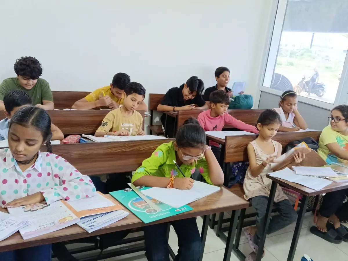 Full class of Mishra Classes students at their desks